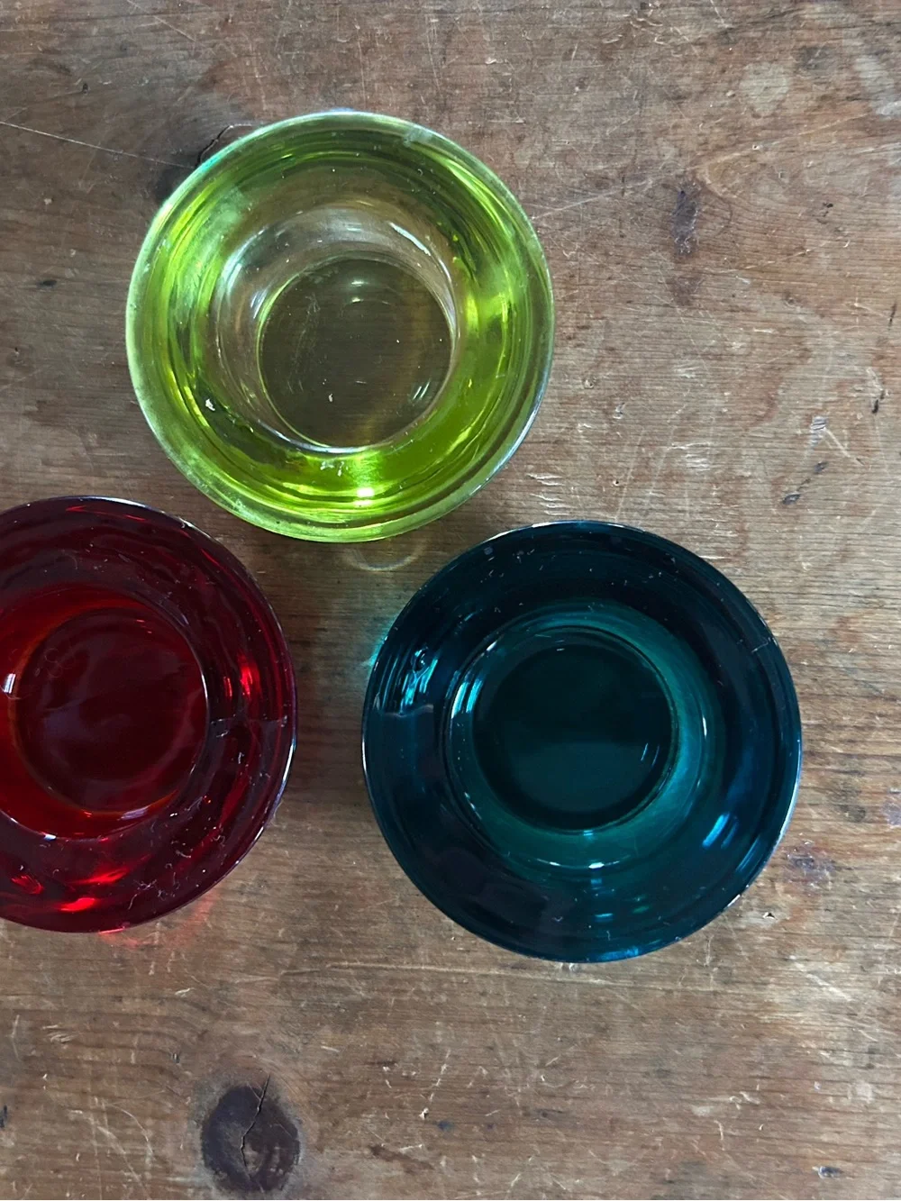 Crate & Barrel assorted colors glass tealight holders. Set of ten.
